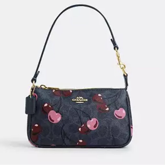Coach NOLITA 19 IN SIGNATURE
CANVAS WITH CHERRY
PRINT
Color DENIM MULTI - Picture 1 of 8
